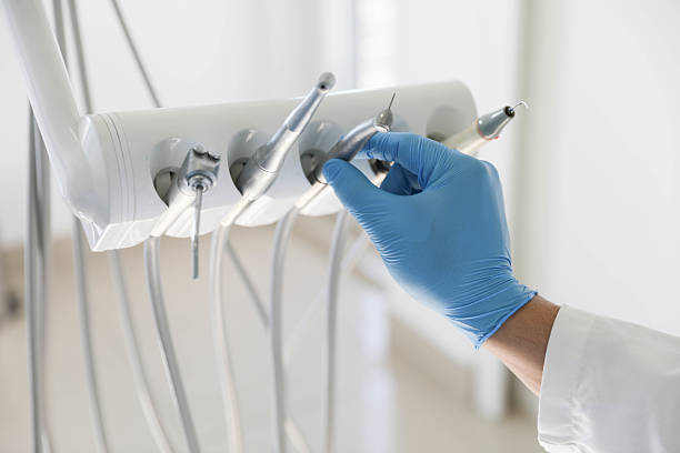 Professional Tooth Extraction technician working in Forrest, IL